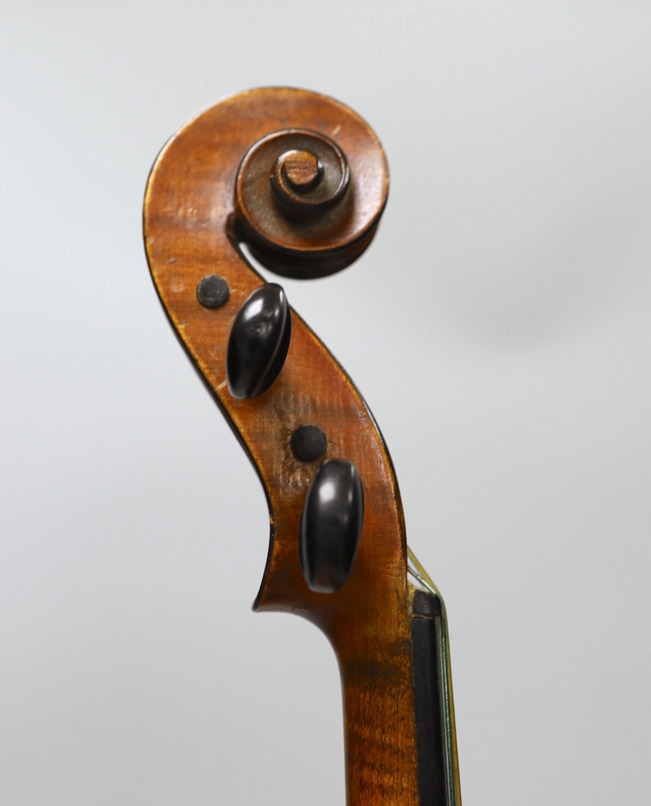A cased French double backed violin, interior label reads ‘Copie de J.B. Vuillaume à Paris.’ Back measures 36cm excluding button